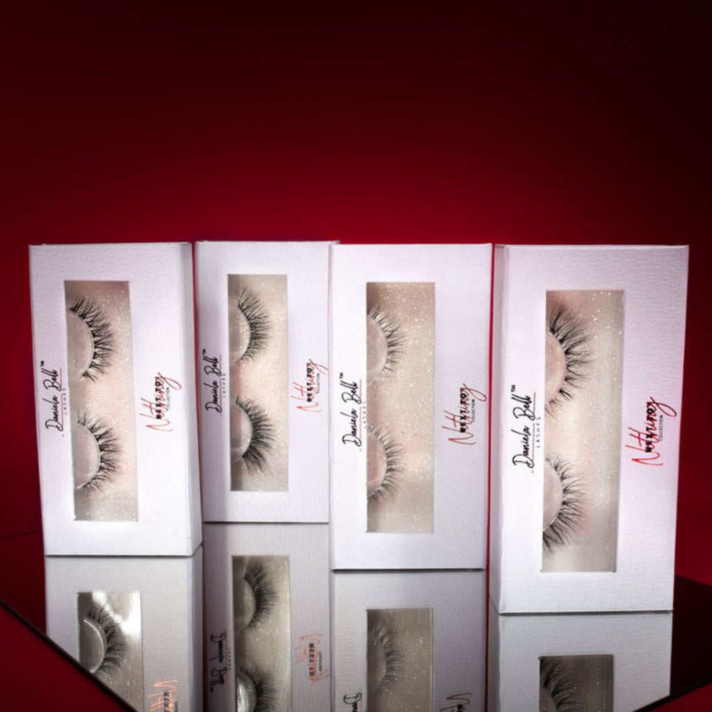 The Next To Nothing Collection. Light fake eyelashes on red background. 